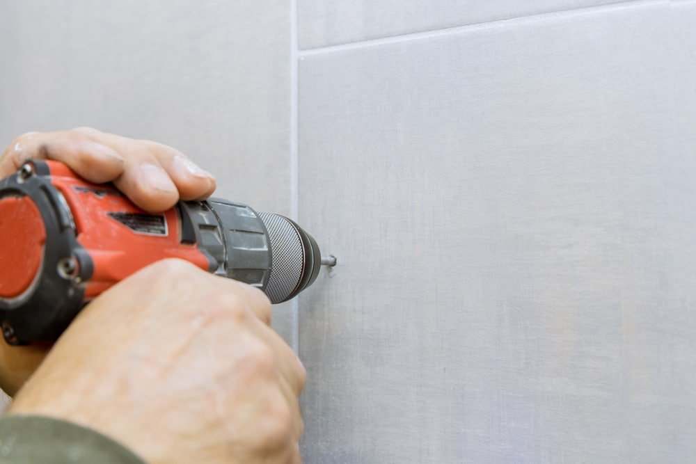 how to drill into tile